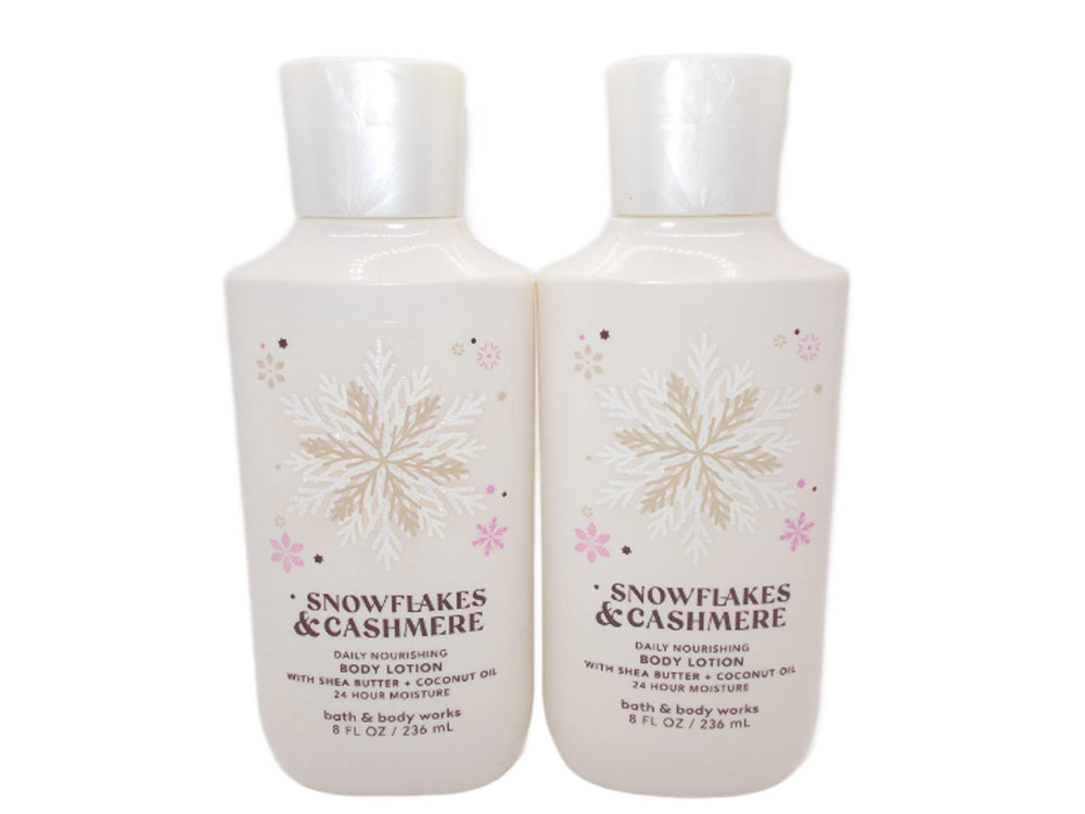 Bath & Body Works Snowflakes & Cashmere 8 oz lotion bottles for daily hydration.