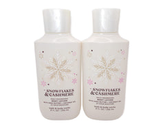 Bath & Body Works Snowflakes & Cashmere 8 oz lotion bottles for daily hydration.