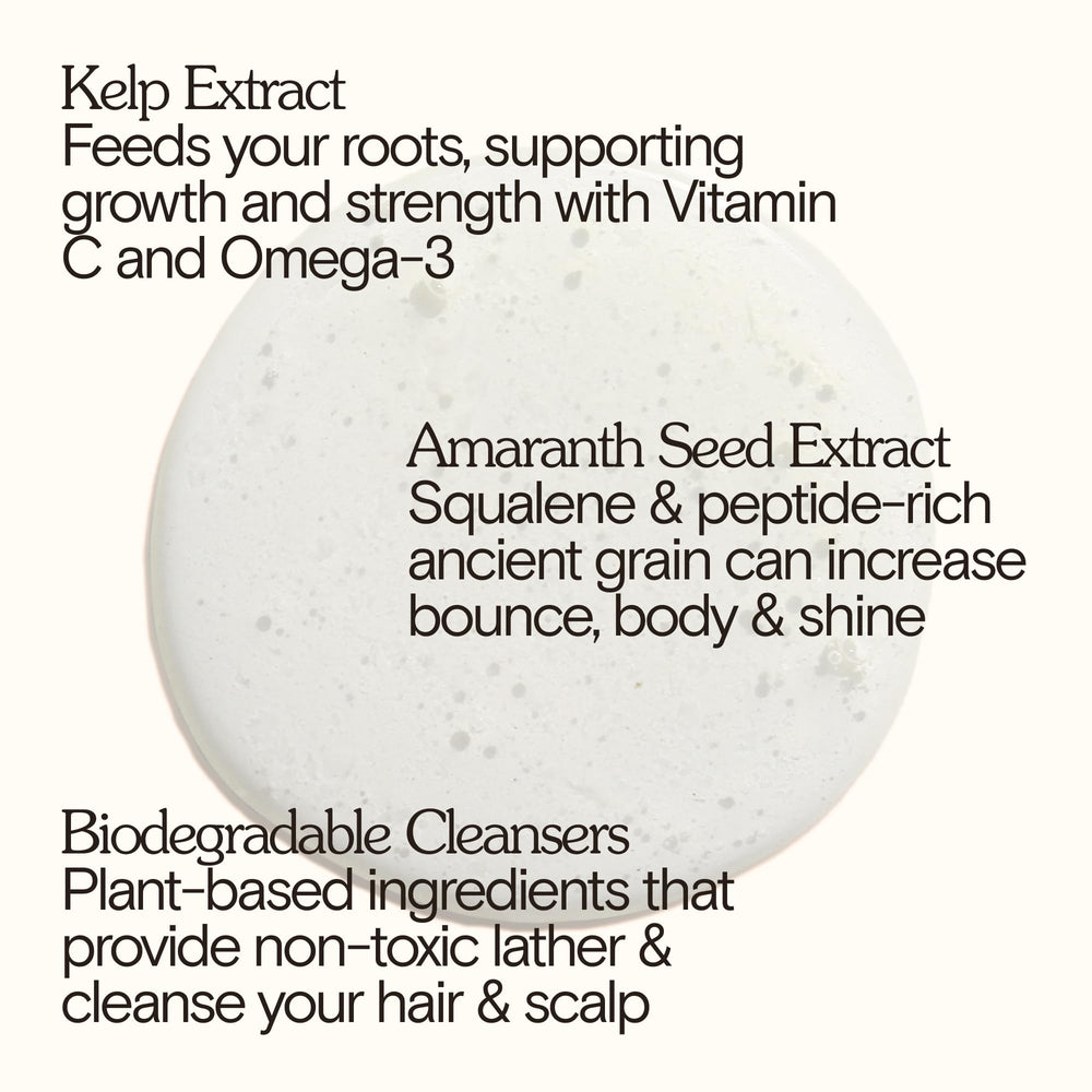 Close-up of Bathing Culture shampoo lather showing coconut-based cleansing action