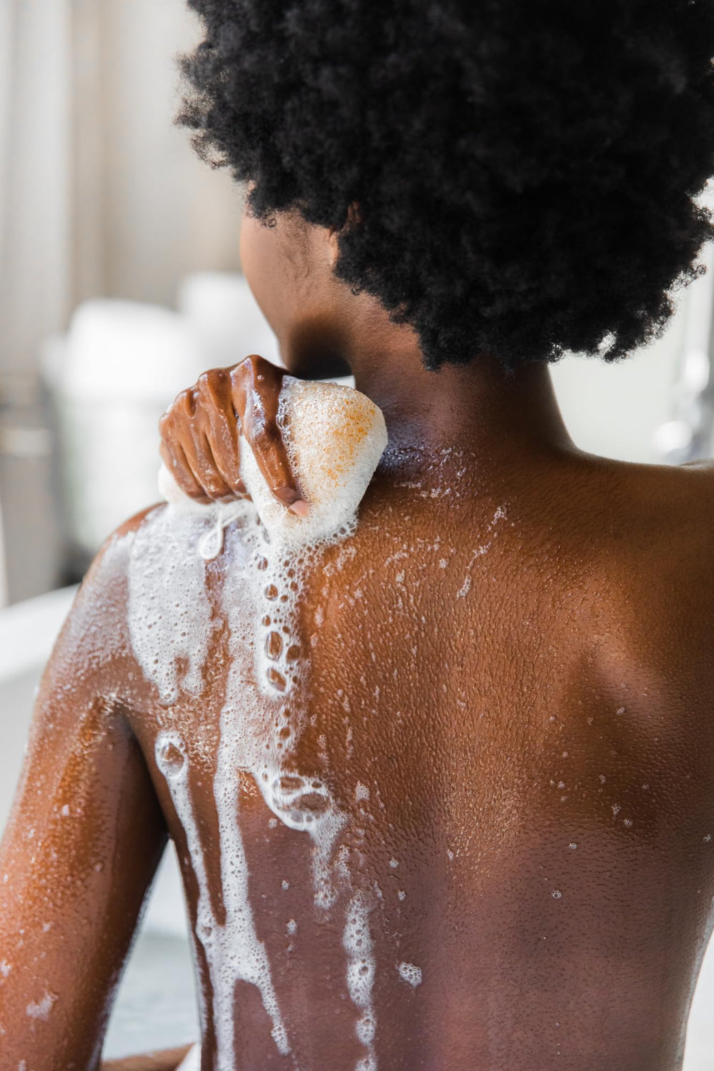 Bathorium Konjac sponge creates creamy lather with bathwater, aiding exfoliation.