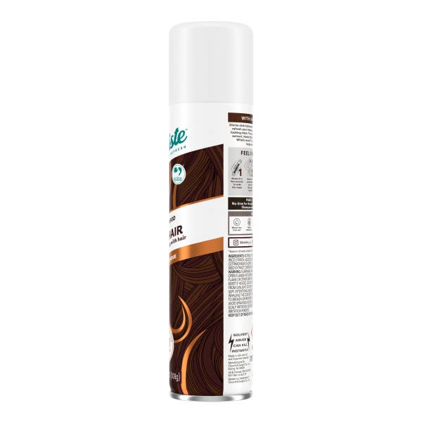 Batiste bottle beside hair in routine scene for quick refresh.