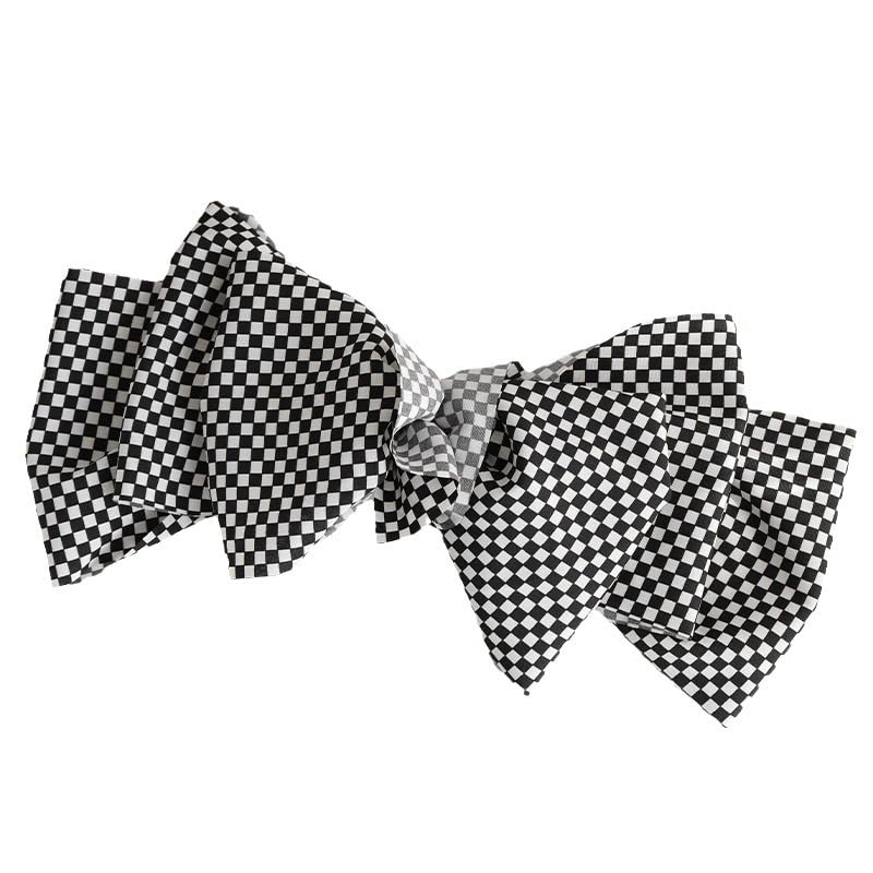 BBTDIN Christmas hair bow adds seasonal charm to ensembles.