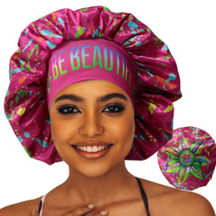 BE BEAUTIFUL EXTENSIONS pink reversible bonnet front view for gentle hair protection.