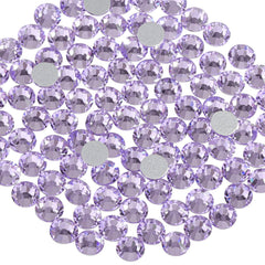 Beadsland violet rhinestones on nails illustrating nail art application