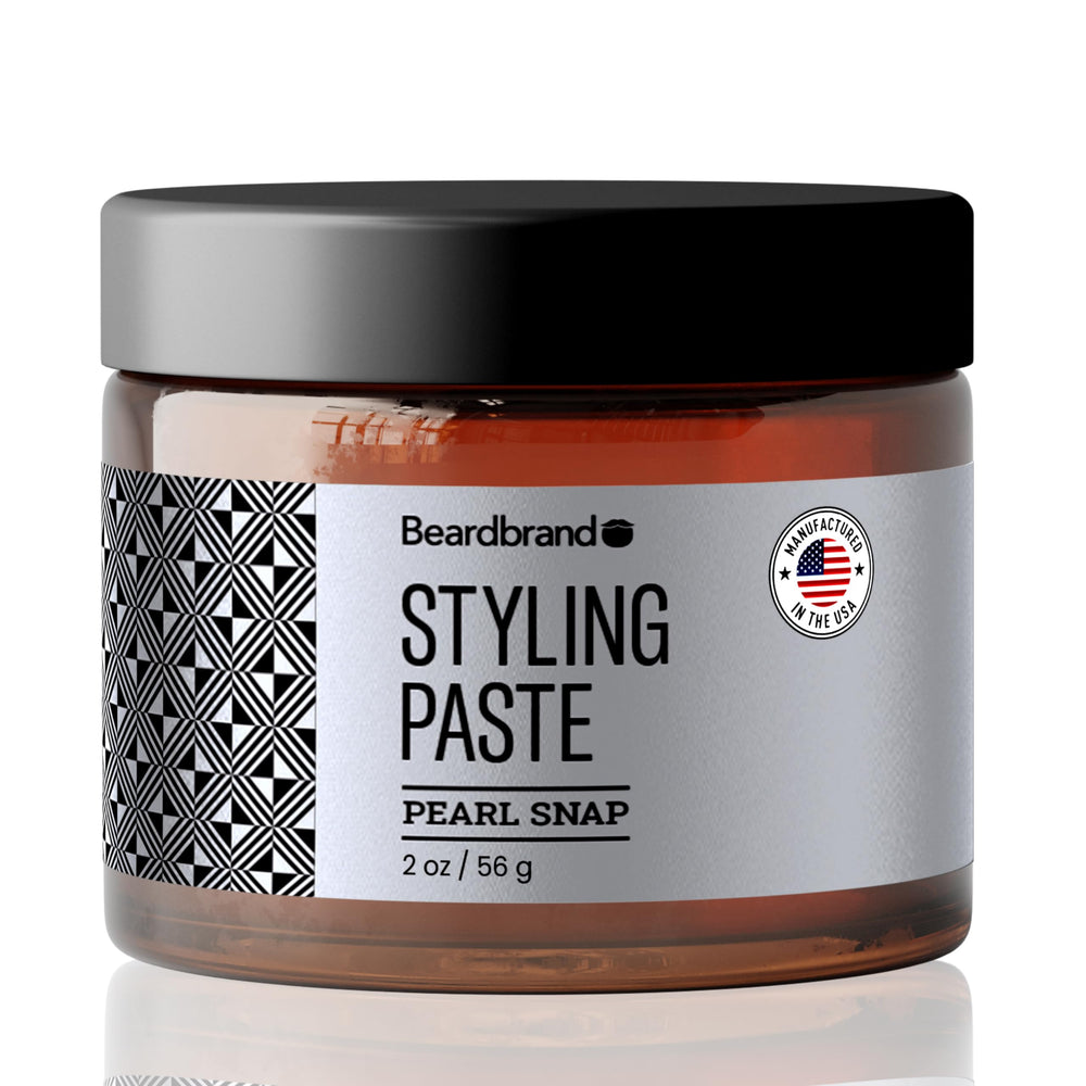 Beardbrand Beard Styling Paste jar close-up showing premium texture for versatile grooming.