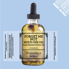 Forget Me Not oil drop close-up shows rich moisture for face and body.