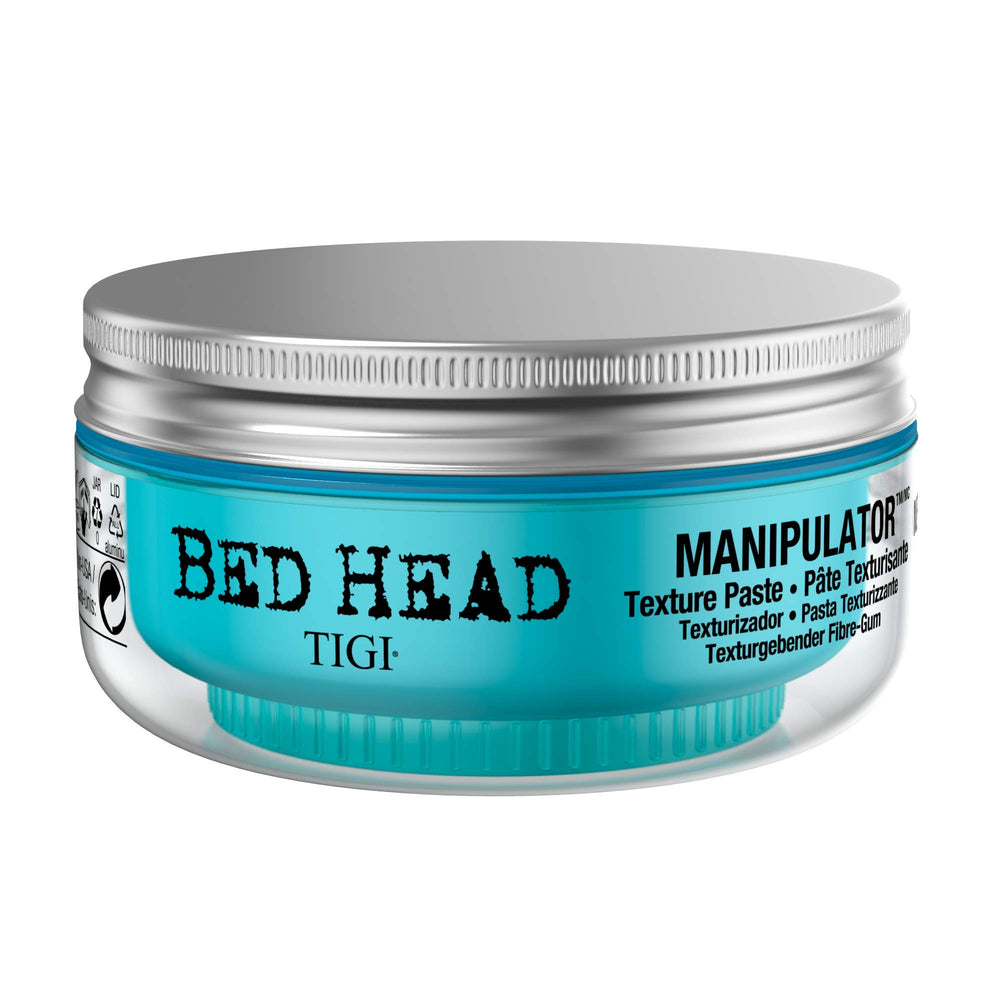 Bed Head Manipulator M2 pack hand-application showing pliable hold.