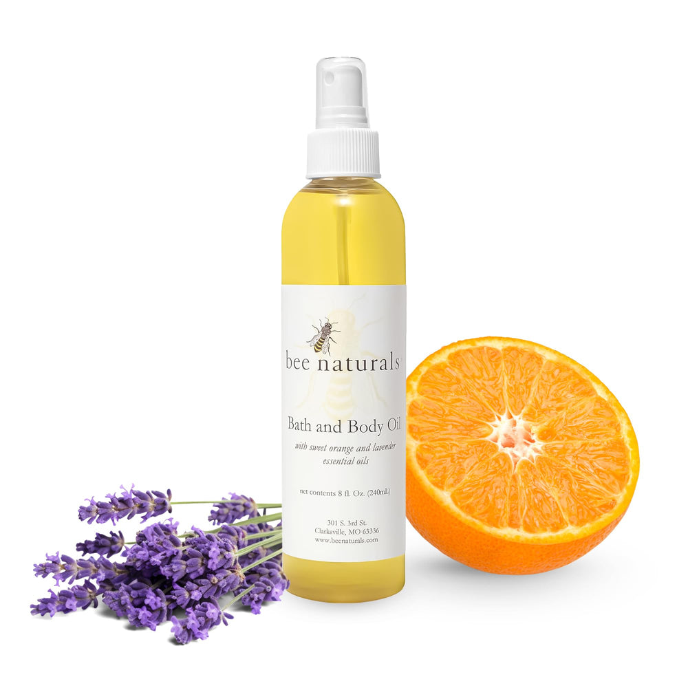 Bee Naturals Bath & Body Oil bottle showing silky hydration and spa like fragrance.