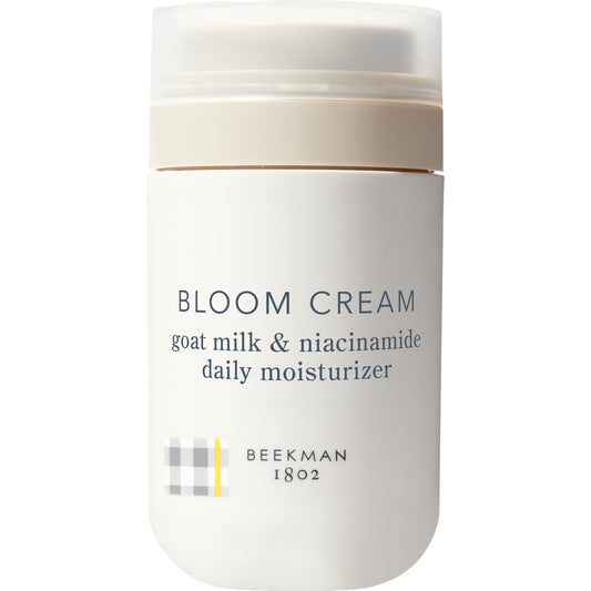 Beekman 1802 Bloom Cream jar closeup showing creamy hydration for daily use.