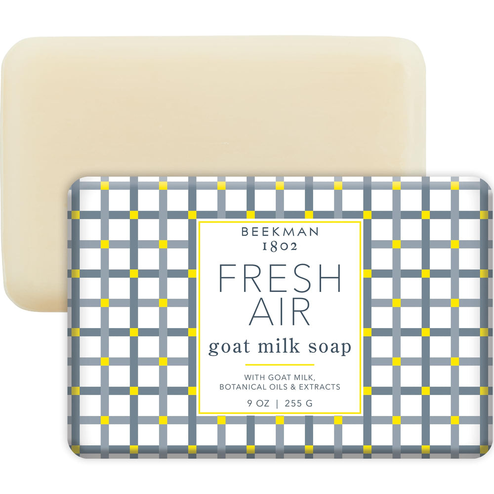 Beekman 1802 Fresh Air goat milk soap bar on a vanity for gentle cleansing.