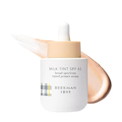 Beekman 1802 Milk Tint Primer SPF 43 bottle offers lightweight mineral protection for daily makeup.
