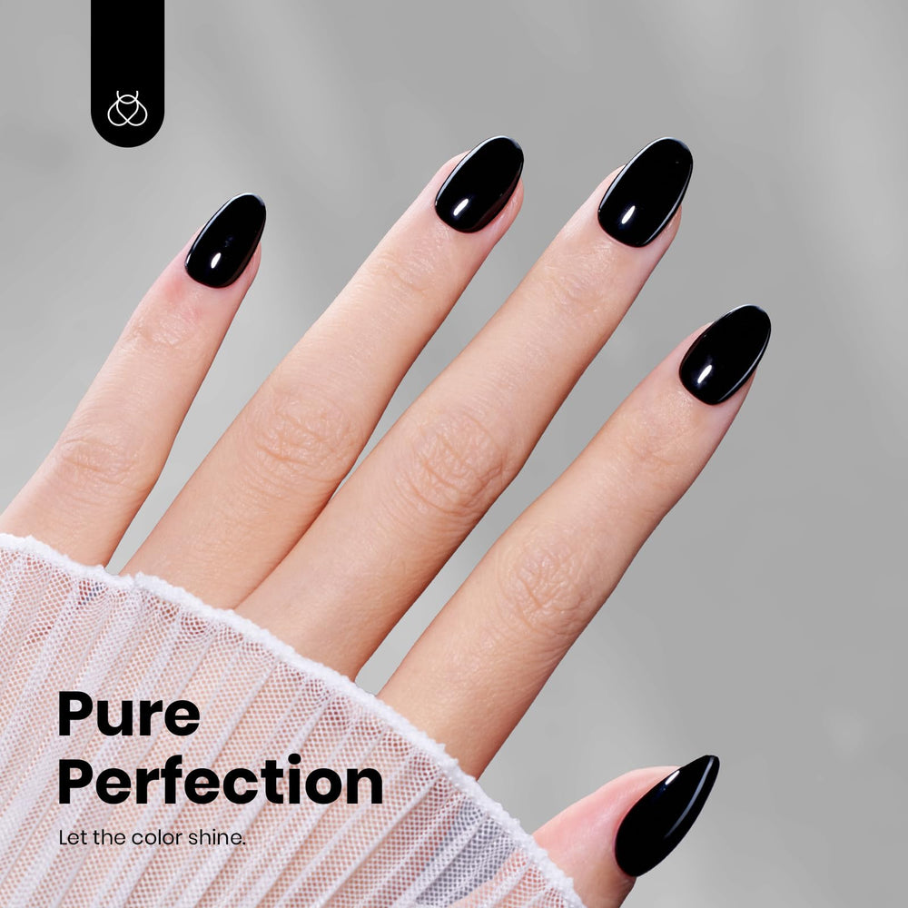 Beetles Black Gel Polish swatch on nail for full-coverage look.