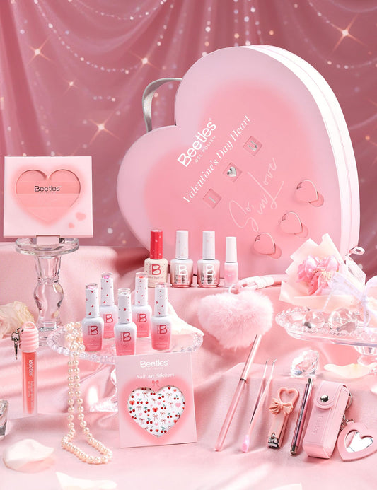 Beetles Glow In Love heart box with pink gel polish for Valentine nails.