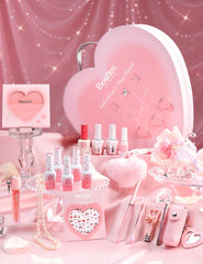 Beetles Glow In Love heart box with pink gel polish for Valentine nails.