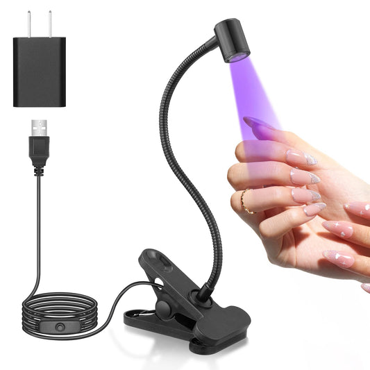 Beetles gel polish nail lamp with clip-on base for easy at-desk curing.
