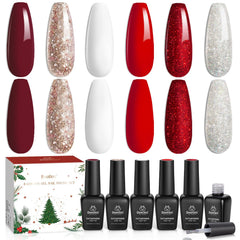 Beetles Holiday manicure on polished nails with red and white accents.