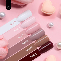 Beetles neutral gel bottles arranged, six-shade nude palette for everyday wear.
