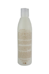 Belegenza GrowOut Shampoo Strengthener pour demonstrates even distribution for thorough cleansing