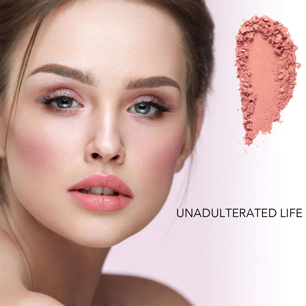 Bellaterra Cosmetics Mineral Loose Blush applied to cheeks creates a natural flush and soft radiance.