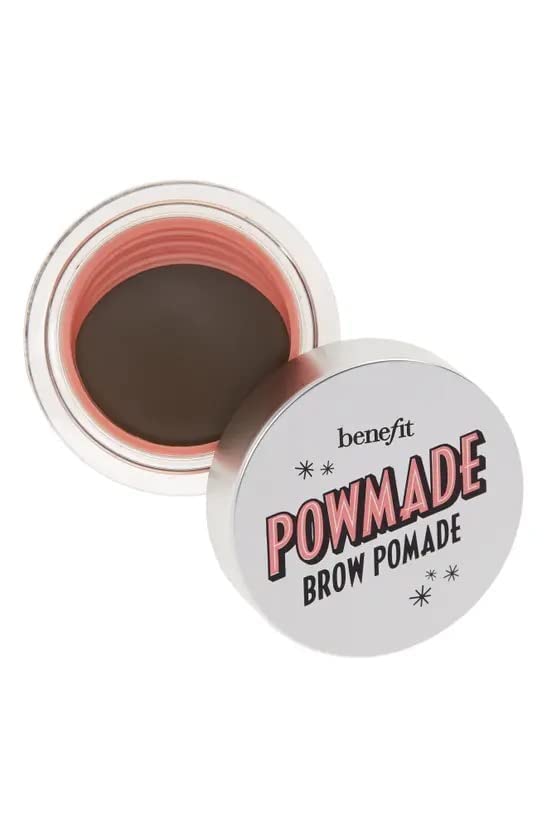 Applying with brush to sculpt brows with precise color.