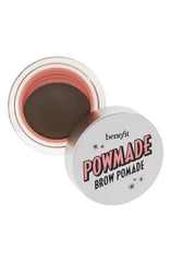 Applying with brush to sculpt brows with precise color.