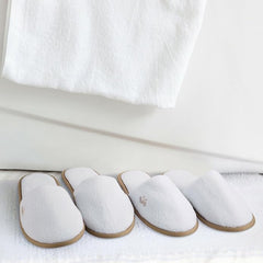 BERGMAN KELLY spa slippers gray textured with black trim ideal for spa settings.