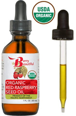 Berry Beautiful organic label raspberry oil highlights organic sourcing and cold-pressed method.