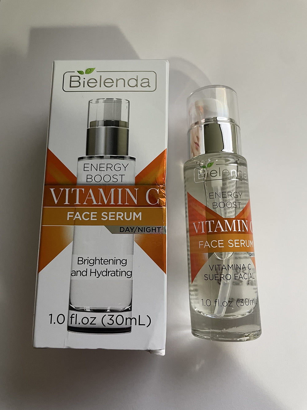 Bielenda Energy Boost Vitamin C Serum on skin showing hydrating glow.
