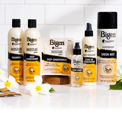 Bigen Silkening Shine Serum being applied to hair for silky finish.