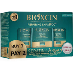Bioxcin Keratin & Argan Shampoo bottle front highlights bond repair for stronger-looking hair.