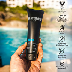 Hands applying HydroBlast conditioner to hair for nourishment
