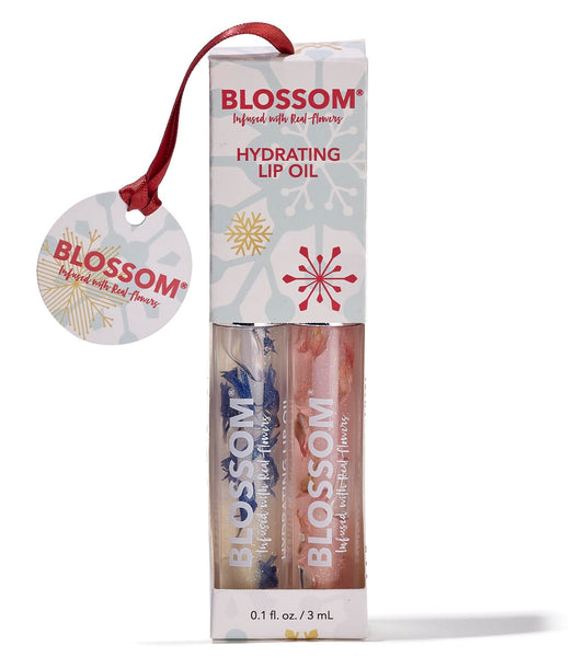 Blossom Lip Oil with Real Flowers close-up showing petals for luxurious hydration.