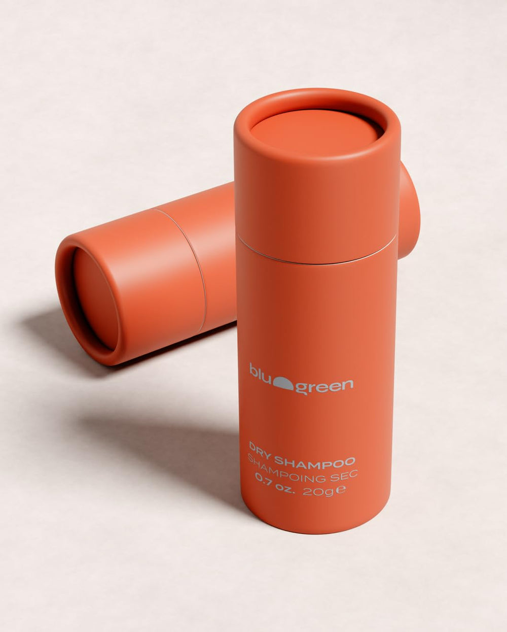 Blu & Green dry shampoo powder shaker closeup gives instant volume boost.