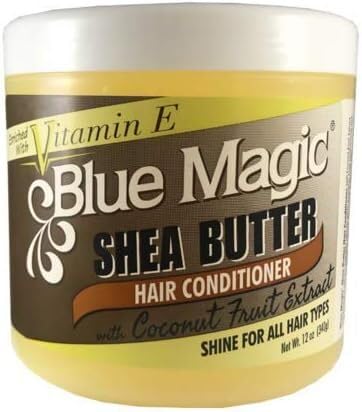 Blue Magic Shea Butter Hair Conditioner bottle with Vitamin E restores moisture for soft, manageable hair.