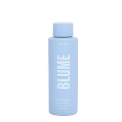 Blume Meltdown bottle pour shows controlled dispensing for quick cleansing.