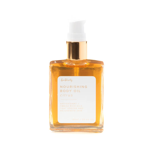 Bonblissity Nourishing Body Oils citrus bottle showing citrus scent and lightweight hydration
