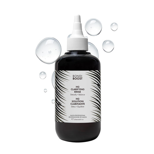 BondiBoost HG Clarifying Rinse bottle demonstrates aloe-based detox for refreshed scalp.