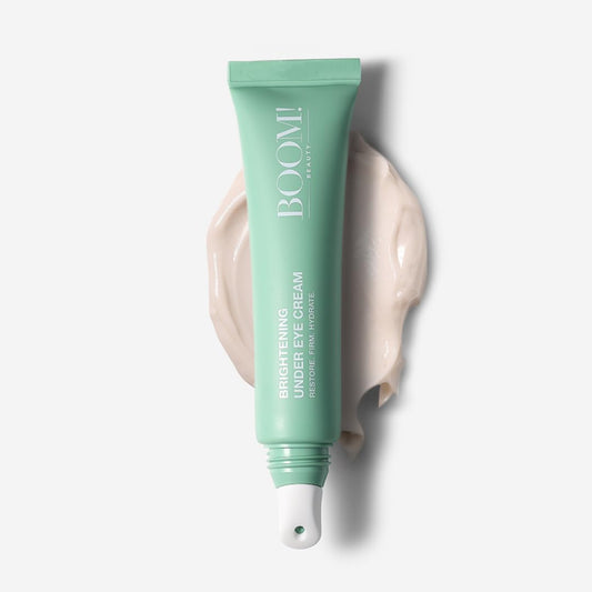 Boom Awaken under-eye cream cooling application reduces puffiness for a refreshed look.