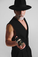Borsalino Black Iris base notes create a magnetic cedar-amber trail.