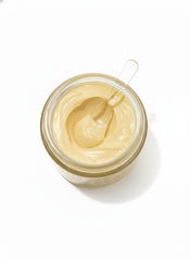 Boulangerie Vanilla Cream application along arms for smooth, soft skin after shower.