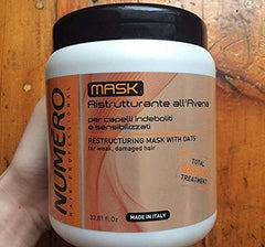 Application of Brelil Numero oat mask on wet hair during routine care.