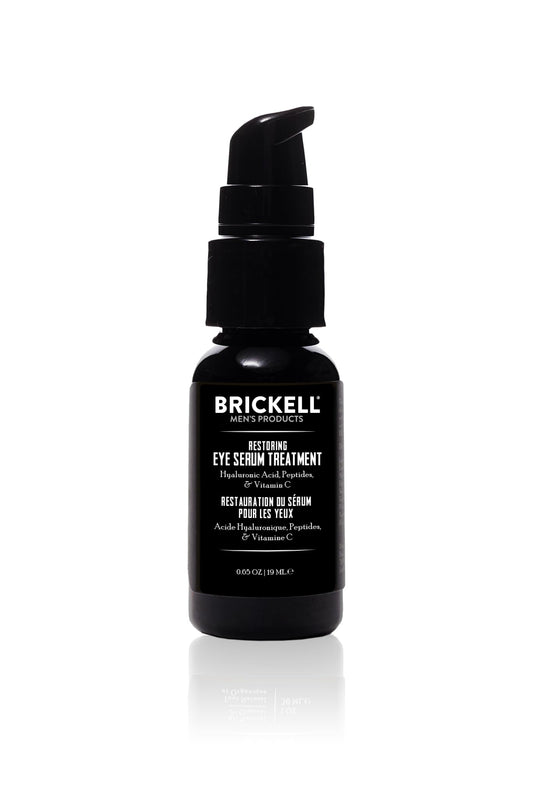 Brickell Men's Dark Circle Serum bottle closeup; unscented formula for refreshed under-eye appearance.