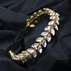 Brihasory bridal headband worn by model for wedding look.