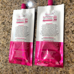 A pack of Brilliant Sunscreen Gel-Cream pouches in a backpack for beach day protection.