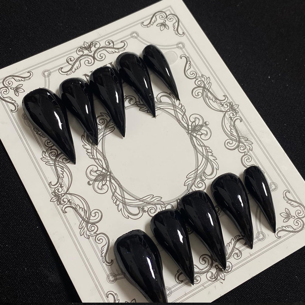 BRKYKGK Eagle Claw nails in glossy black pack for quick glam.