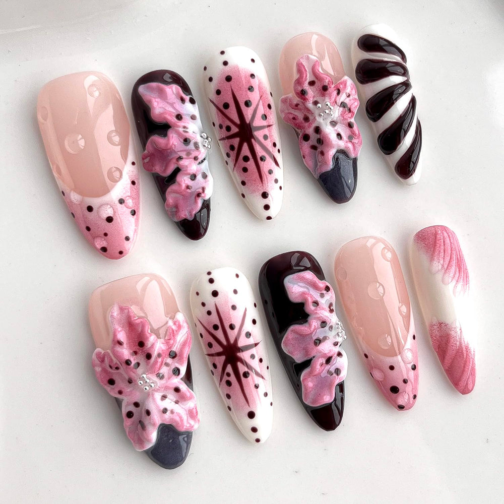 BRKYKGK almond medium nails with polka dots for playful style