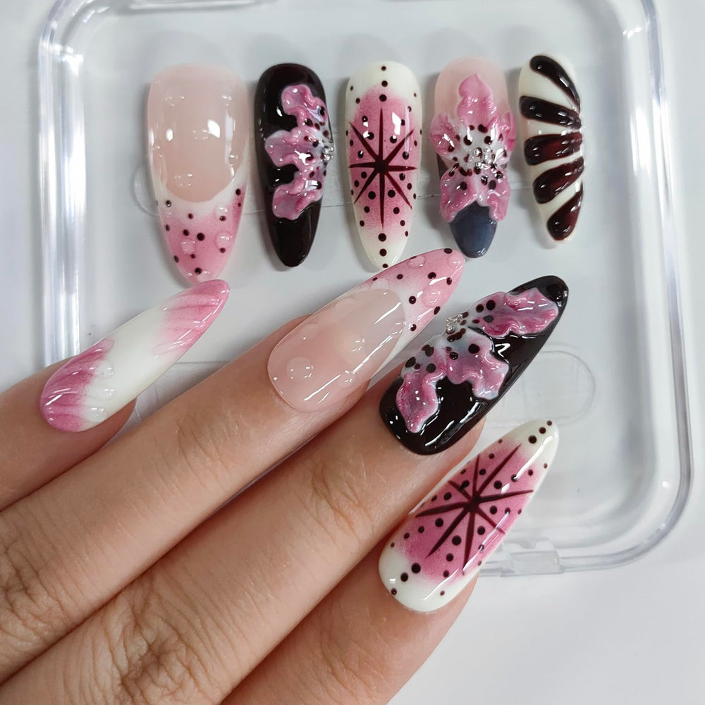 BRKYKGK almond nails with rose floral accents for romantic manicure