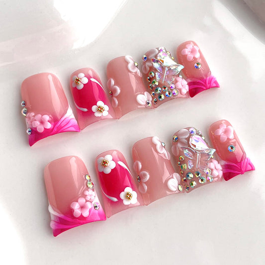 BRKYKGK pink duck nails with short tips and 3D florals for quick, chic manicures