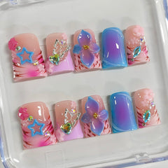 BRKYKGK short duck nails with 3D flower accents for a playful look.