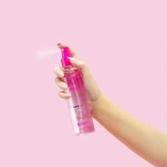 B.TAN mist drying on skin during application for quick set